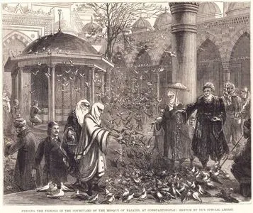İstanbul’daBeyazıt Camii Avlusunda Güvercinleri Besleyenler